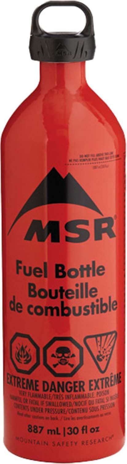 MSR Fuel Bottle displayed on a rocky trail during a hike